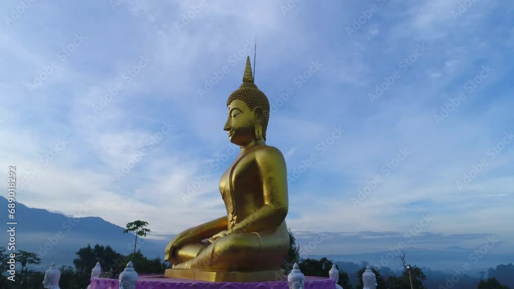 Huge Gold Budda Crane Shot Aerial Drone Statue Towering Mountians Laos Thailand Cinematic Huge Gold Budda Crane Shot Aerial Drone Statue Towering Mountians Laos Thailand Cinematic