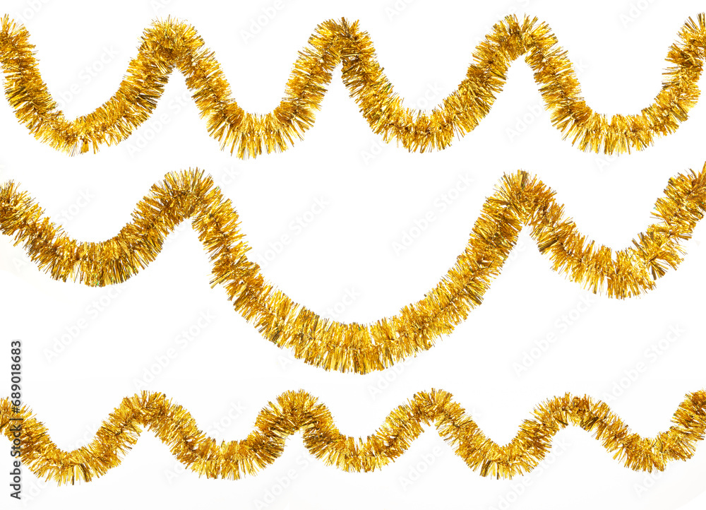 Christmas yellow golden foil tinsel isolated on a white background.