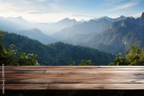 A wooden table for product display with a blurry mountain range landscape background