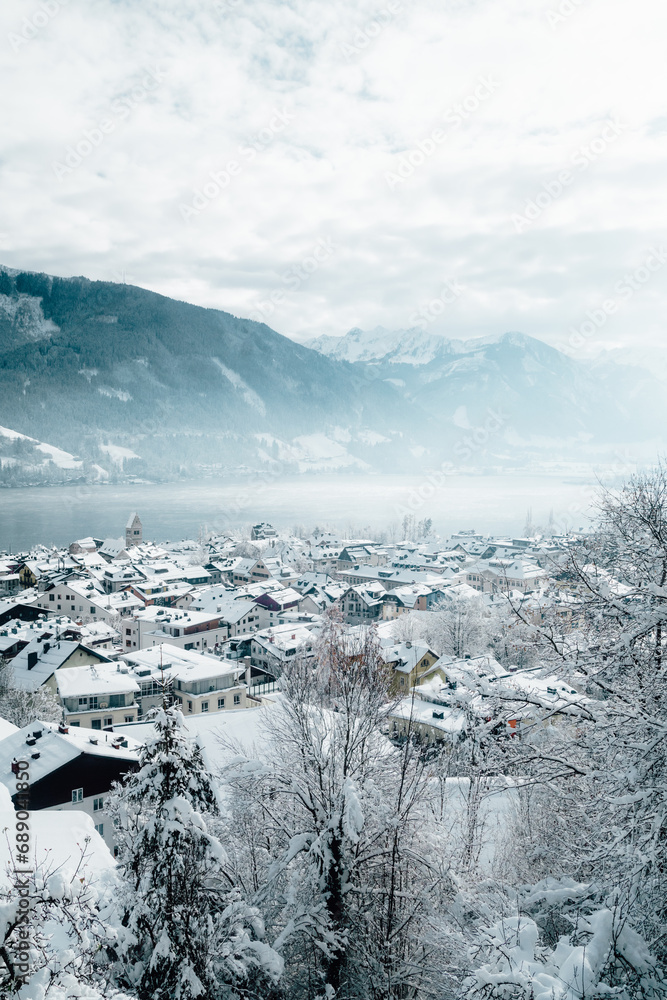 Alpine resort town of Zell am See with lake on a beautiful cold winter day, Salzburg Land region, Austria