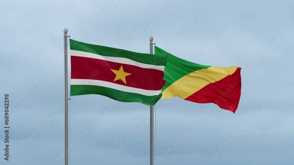 Republic of the Congo flag and Suriname flag waving together on cloudy sky, endless seamless loop, two country relations concept Republic of the Congo flag and Suriname flag waving together on cloudy sky, endless seamless loop, two country relations concept