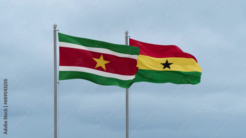 Ghana flag and Suriname flag waving together on cloudy sky, endless seamless loop, two country relations concept Ghana flag and Suriname flag waving together on cloudy sky, endless seamless loop, two country relations concept
