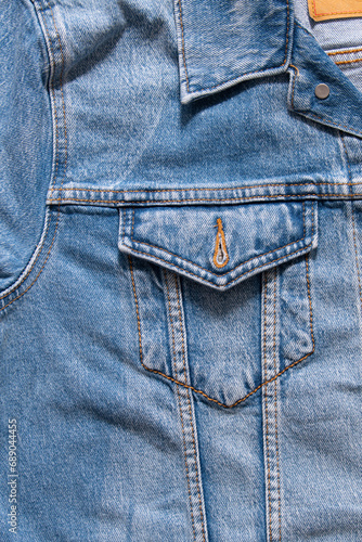 Top View of Blue Denim Pocket on Truckers Jacket