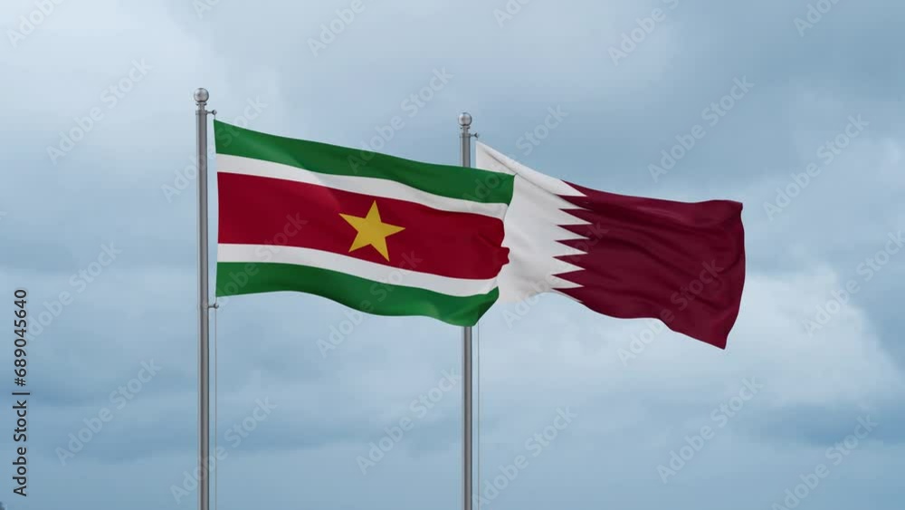 Qatar and Suriname flag waving together on cloudy sky, endless seamless loop, two country cooperation concept Qatar and Suriname flag waving together on cloudy sky, endless seamless loop, two country cooperation concept