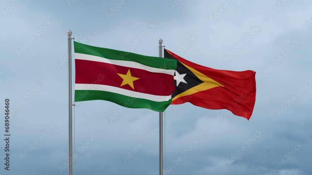 East Timor and Suriname flag waving together on cloudy sky, endless seamless loop, two country cooperation concept East Timor and Suriname flag waving together on cloudy sky, endless seamless loop, two country cooperation concept