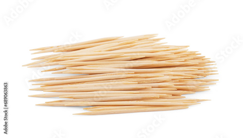 Wooden toothpicks isolated on white background photo