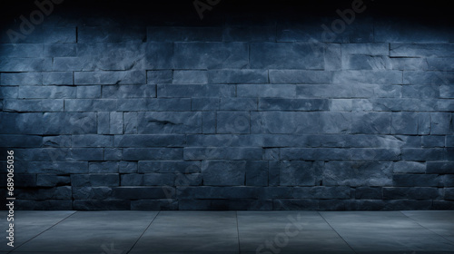 A brick wall and floor in a dark room