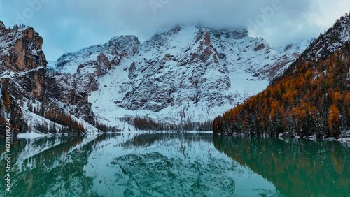 Aerial drone view of Lake Briers Pragser Wildsee Dolomites South Tyrol Italy. Autumn mountain landscape. High quality 4k footage photo