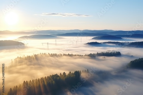 Solar energy fields and wind turbines seen from the air in foggy conditions during a Autumn morning. Muntendam --