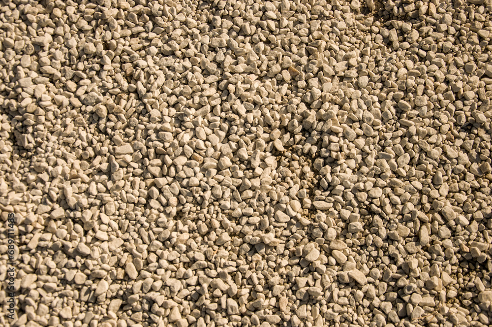 White small stone background. natural rocks in the garden. White small stone background. natural rocks in the garden.