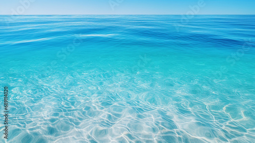 Tranquil Blue Sea  Clear Azure Water Background with Calm Ripples - Serene Ocean Surface for Idyllic Summer Scenics and Relaxing Nature Textures.