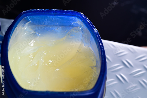 Petroleum jelly in a jar. Close up shot photo