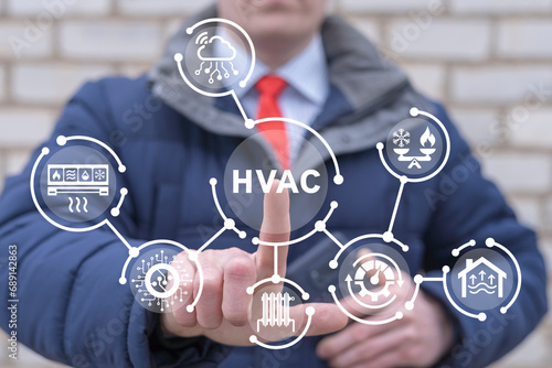 Canvas Print Man using virtual touch screen presses abbreviation: HVAC