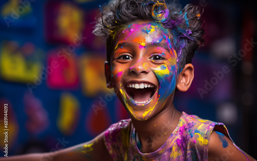 Enthusiastic Indian Boy in Painting with Colors in Painting Class
