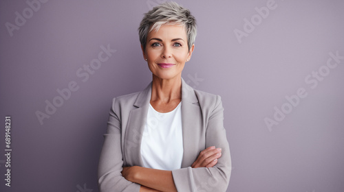 Confident woman in business suite portrait. Short blonde hair style.  photo