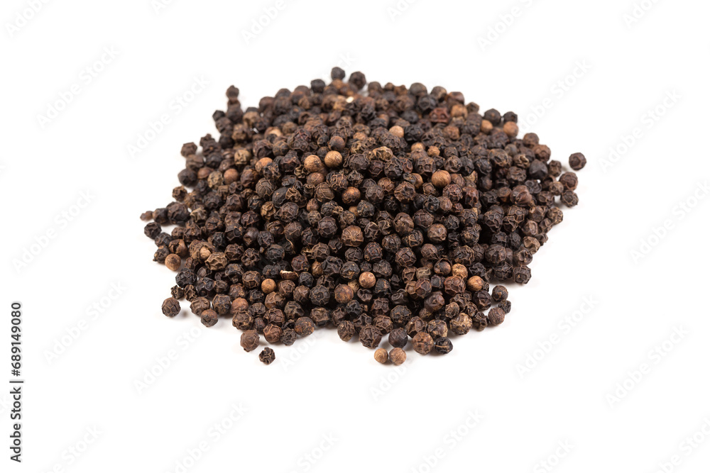 Black pepper was placed on a white background Black pepper was placed on a white background