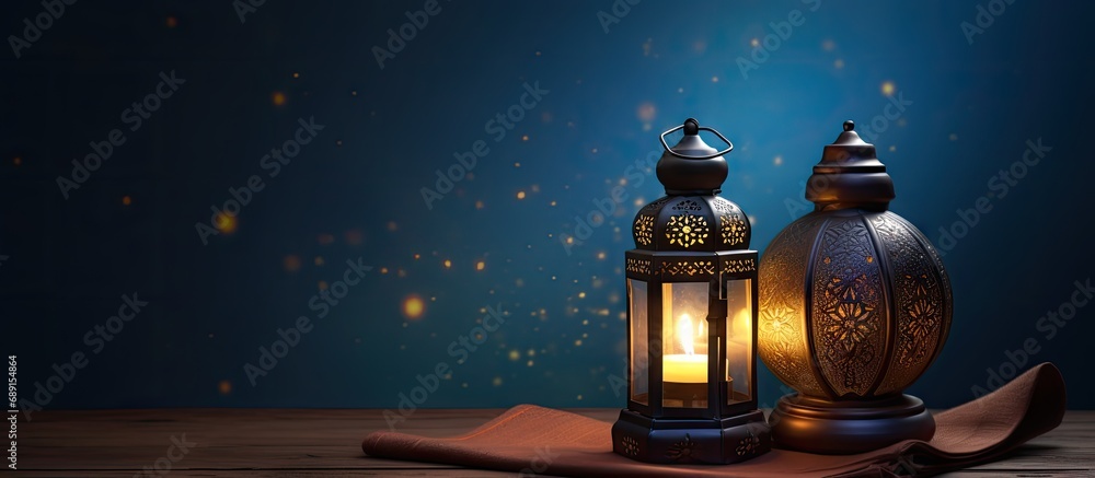 Celebrate Ramadan with a lit lantern and the Holy Quran Copy space image Place for adding text or design Celebrate Ramadan with a lit lantern and the Holy Quran Copy space image Place for adding text or design