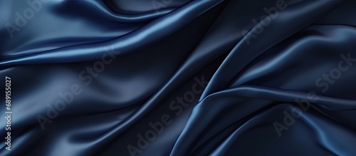 Luxurious blue silk satin backdrop with space for text design Web banner Top view table for special occasions Copy space image Place for adding text or design photo