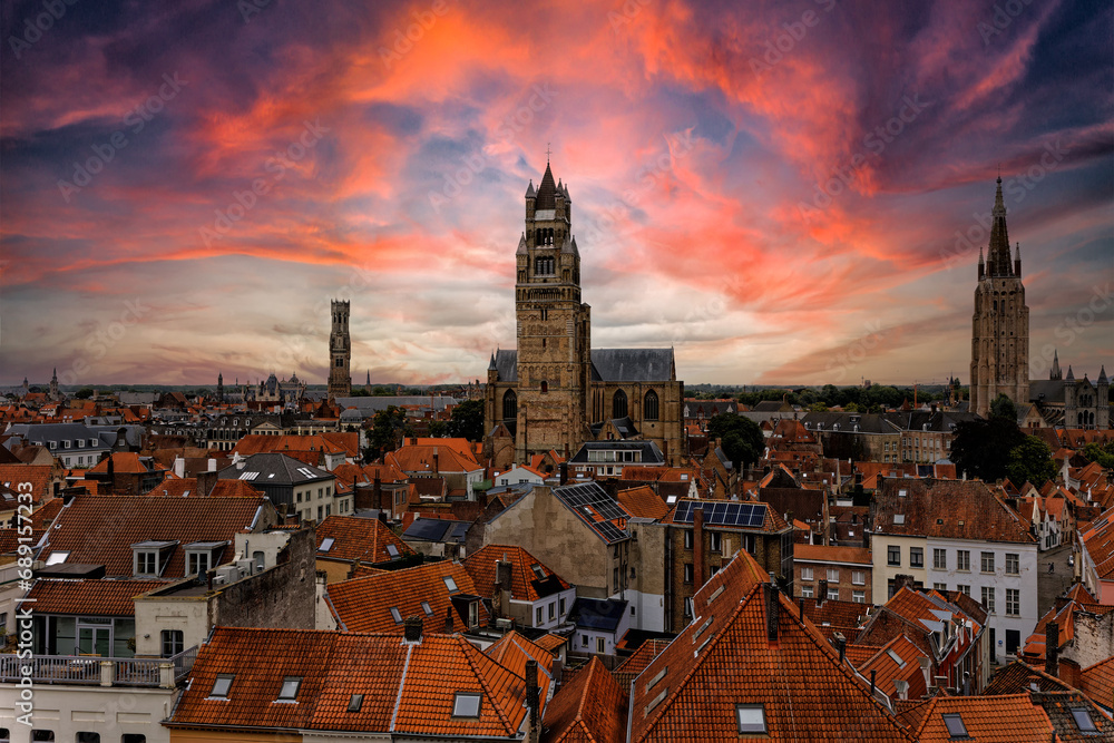 Fototapeta premium Medieval Town Bruges old city in Flanders in Belgium Europe. Art and culture. Tourists from the world. Ancient medieval architecture gothic with towers buildings, canals, cobbled alleyways horses