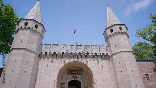 turkey Istanbul, May 2023: Entrance Door of Topkapi Palace in Istanbul, Turkey. The Gate of Salutation at Topkapi Palace, details and buildings of famous museum complex at Istanbul city.
 photo