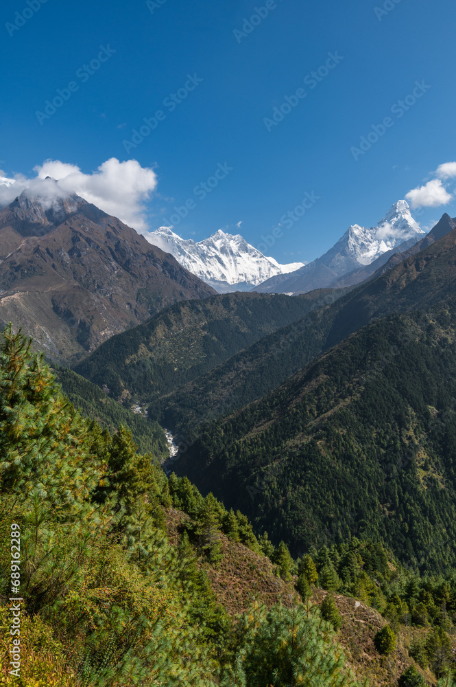 View of Nuptse, Everest and Lhotse mountains during trekking in Nepal in a clear day. EBC or Three passes trek in Nepal. Mountain range Himalayas in the Khumbu region of Nepal, Asia.