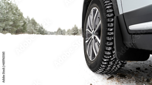 A car with winter tires on snow