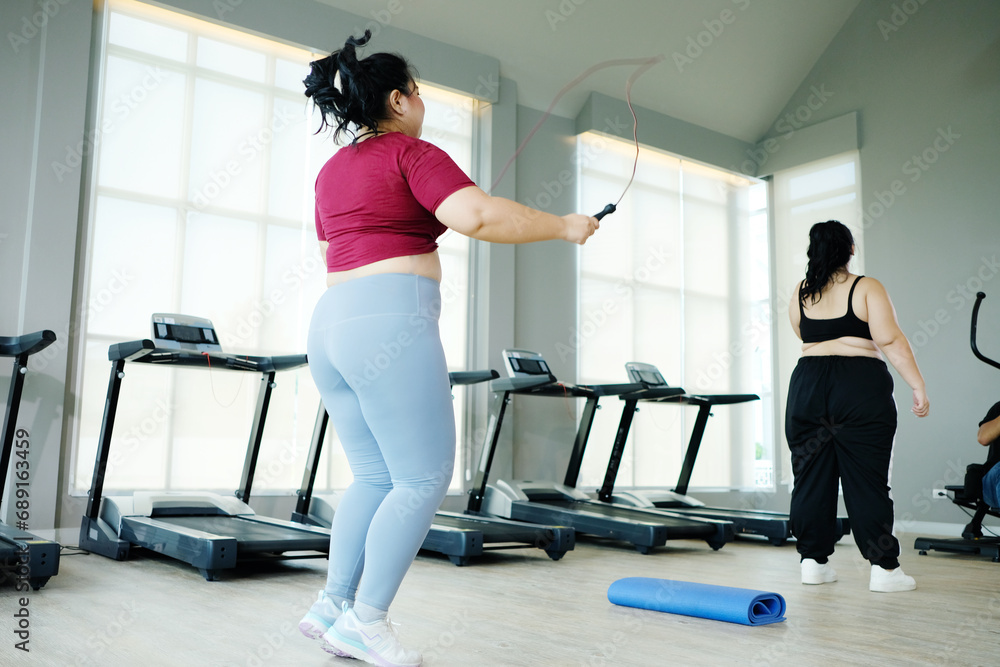 young woman jumping rope to exercise Exercise concept to lose weight.