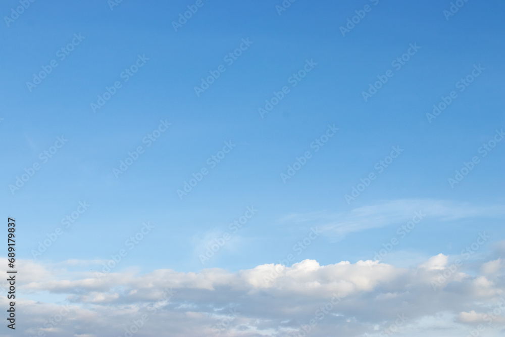 Sky with white clouds, blue space for letters. natural background and texture.