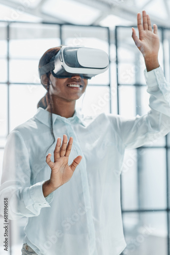 Businesswoman using vr glasses to view educational material and financial documents © Katsiaryna