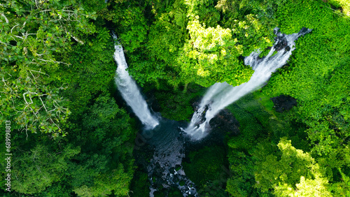 Aerial view of Sekumpul waterfall on Bali island Indonesia - travel and nature background. Drone photo