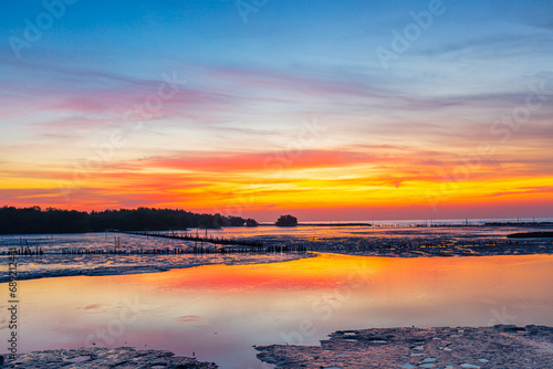 Coastal scenery and sunrise in the morning,sunrise in early morning hours in egypt close to Marsa alam sun reflexion in the red sea photo