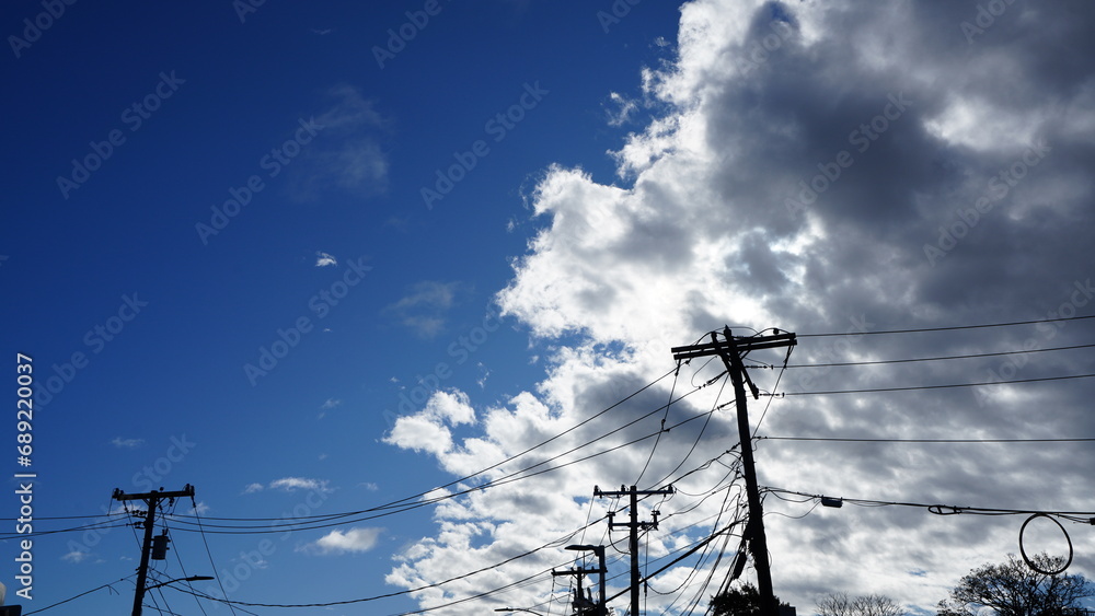 The beautiful sky view with the white clouds and blue sky in the sunny day The beautiful sky view with the white clouds and blue sky in the sunny day
