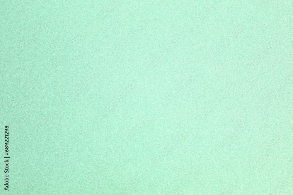 Macro closeup of kraft light green paper texture Macro closeup of kraft light green paper texture