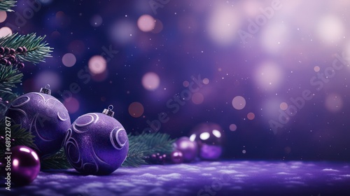 Christmas background with purple baubles and fir branches on snow. photo