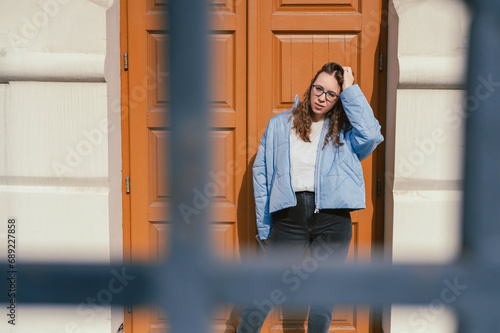 Portrait of a stylish woman in blue jacket