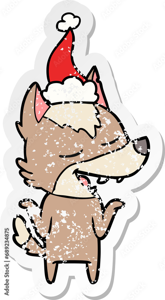 Fototapeta premium hand drawn distressed sticker cartoon of a wolf laughing wearing santa hat