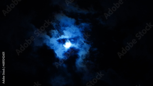 The moon night view with the full moon and clouds in the sky © Bo