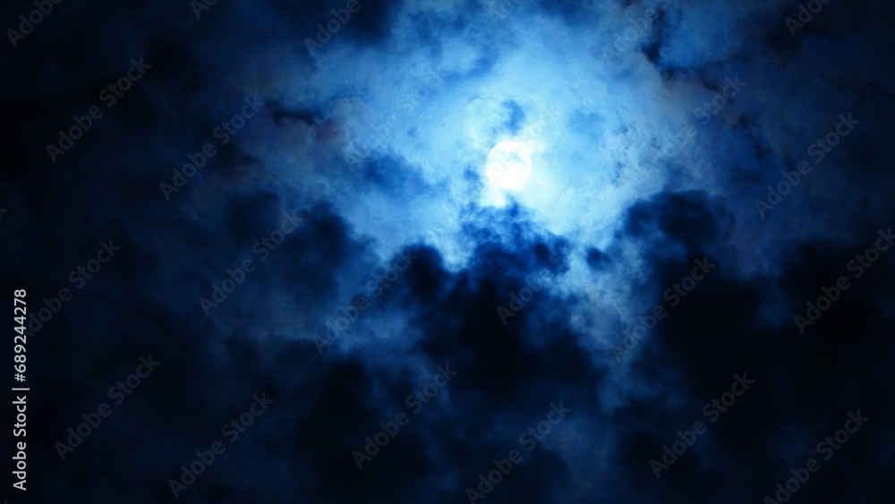 The moon night view with the full moon and clouds in the sky The moon night view with the full moon and clouds in the sky