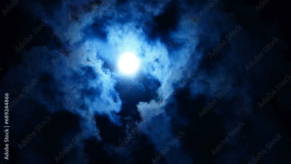 The moon night view with the full moon and clouds in the sky The moon night view with the full moon and clouds in the sky