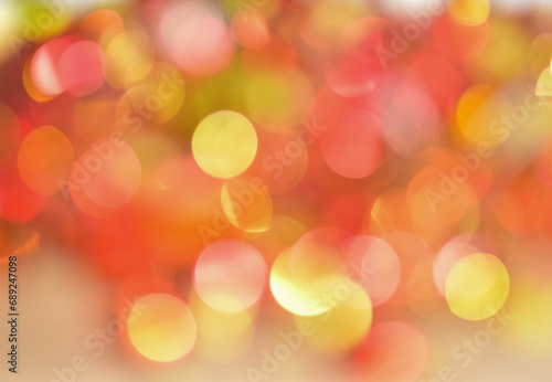 Bokeh - Real fir branches with glitter in an abstract blurry background - This picture has Christmas lights.