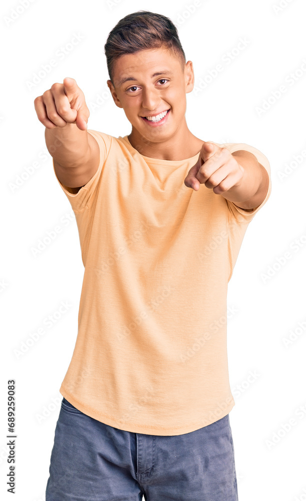 Young handsome man wearing casual clothes pointing to you and the camera with fingers, smiling positive and cheerful Young handsome man wearing casual clothes pointing to you and the camera with fingers, smiling positive and cheerful