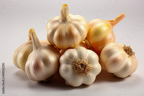 Heads of garlic on a white background. Generative AI.