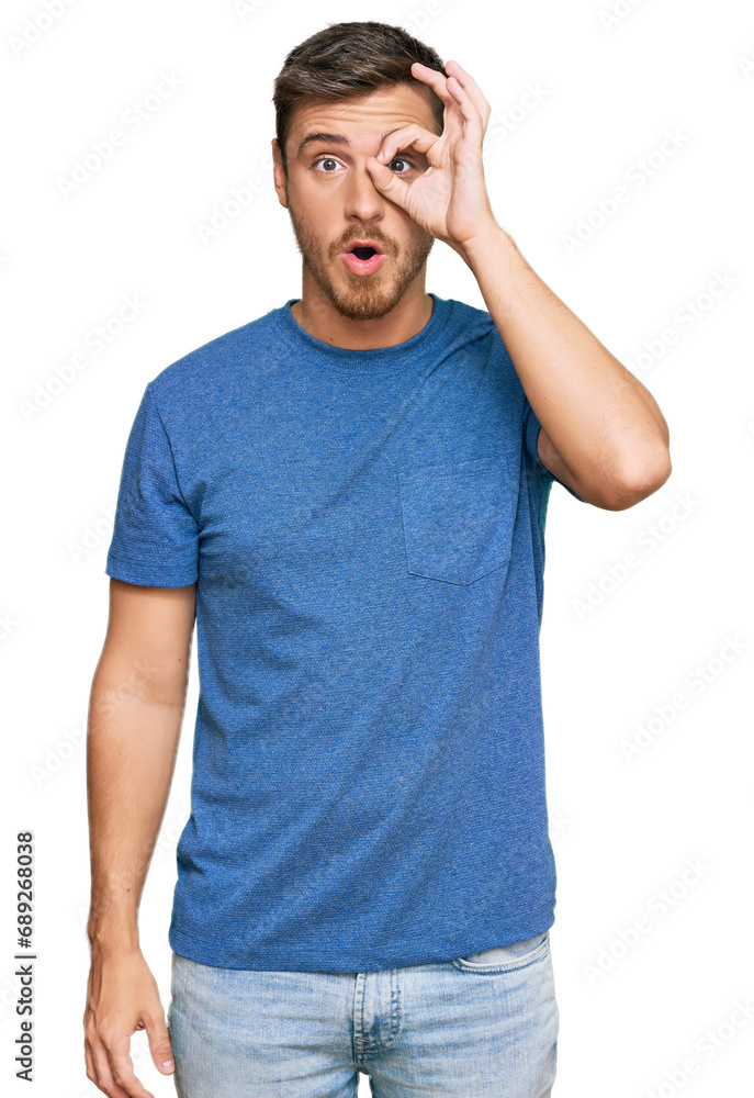 Handsome caucasian man wearing casual clothes doing ok gesture shocked with surprised face, eye looking through fingers. unbelieving expression. Handsome caucasian man wearing casual clothes doing ok gesture shocked with surprised face, eye looking through fingers. unbelieving expression.