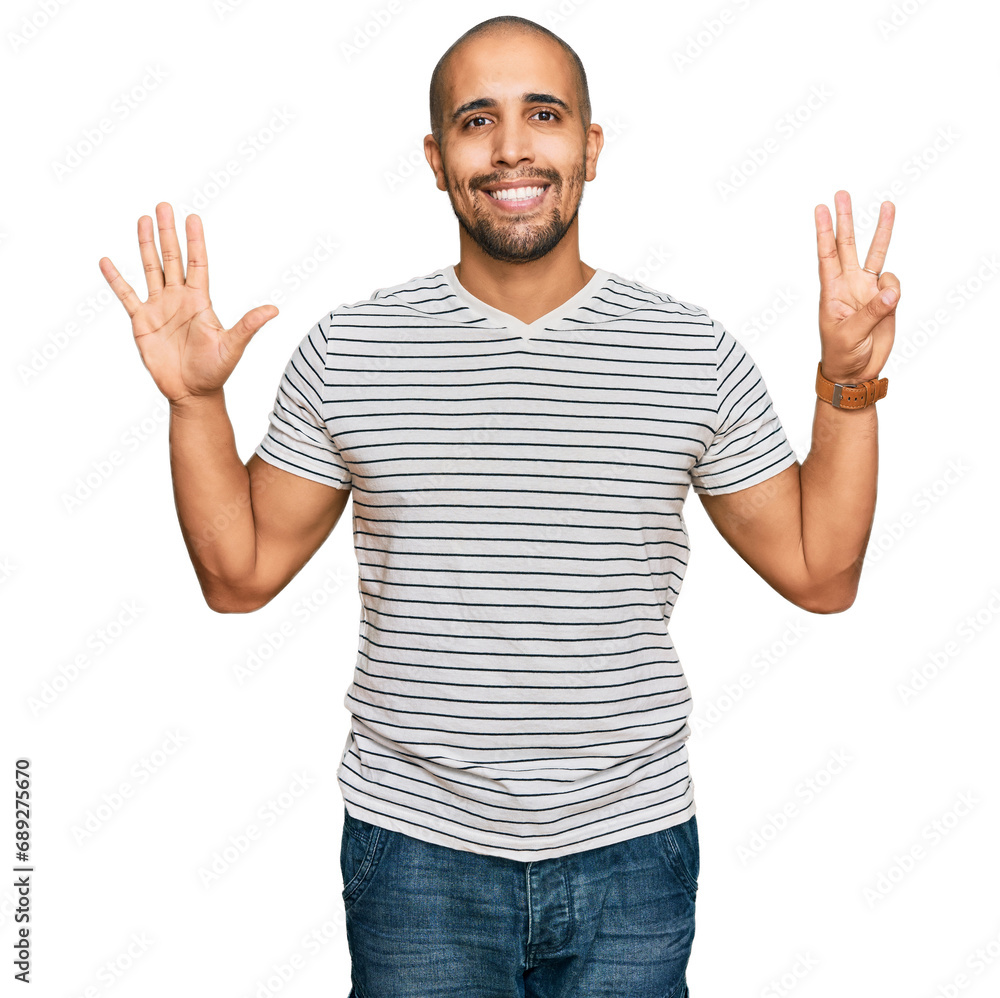 Hispanic adult man wearing casual clothes showing and pointing up with fingers number eight while smiling confident and happy. Hispanic adult man wearing casual clothes showing and pointing up with fingers number eight while smiling confident and happy.