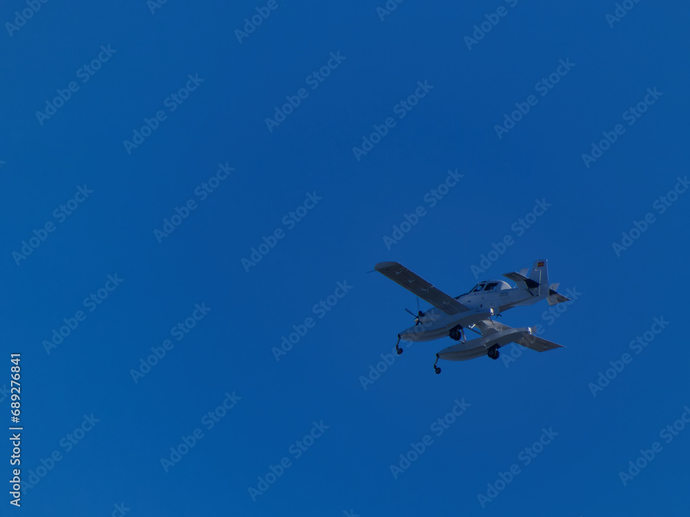 Plane avionetka aviation flight sky blue floats small passenger Plane avionetka aviation flight sky blue floats small passenger