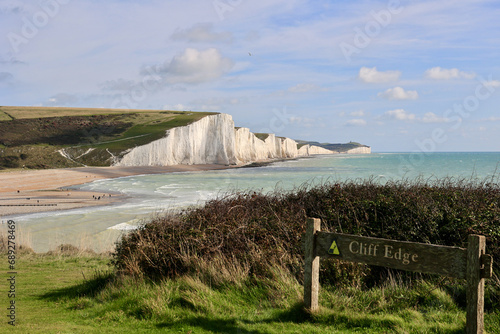 A warning sign Cliff Edge on the south coast of Britain. The Seven Sisters.