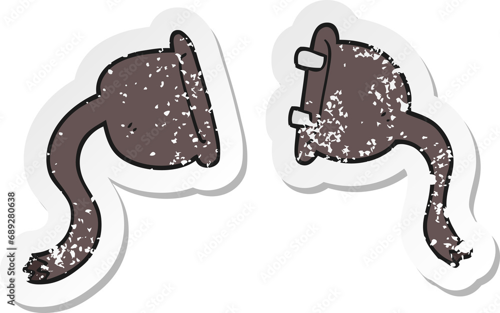 retro distressed sticker of a cartoon electrical plugs retro distressed sticker of a cartoon electrical plugs