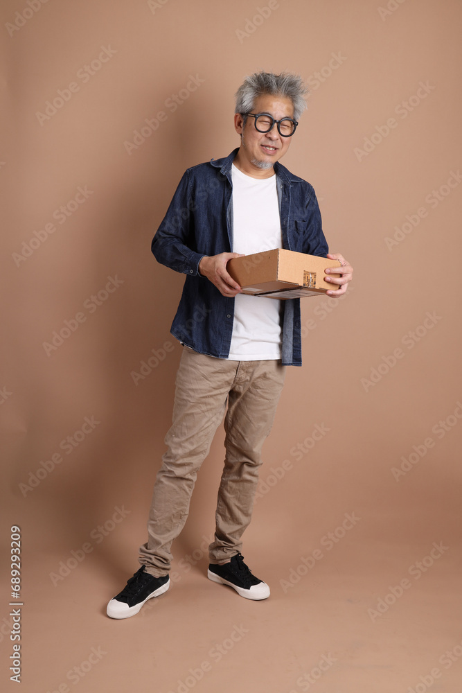 Holding a box Holding a box