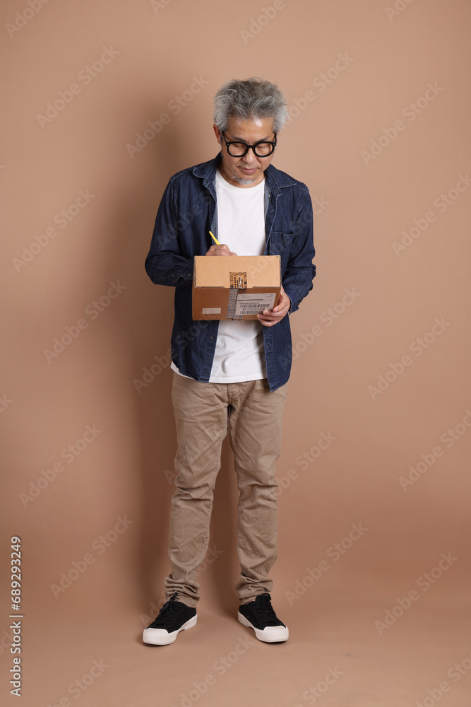 Holding a box Holding a box