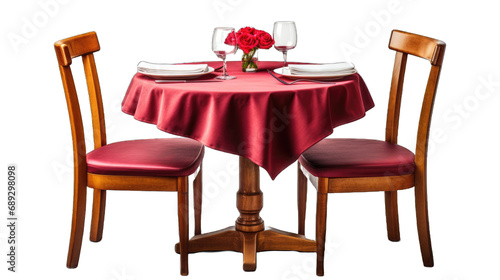 Round restaurant table with a cloth set for two persons